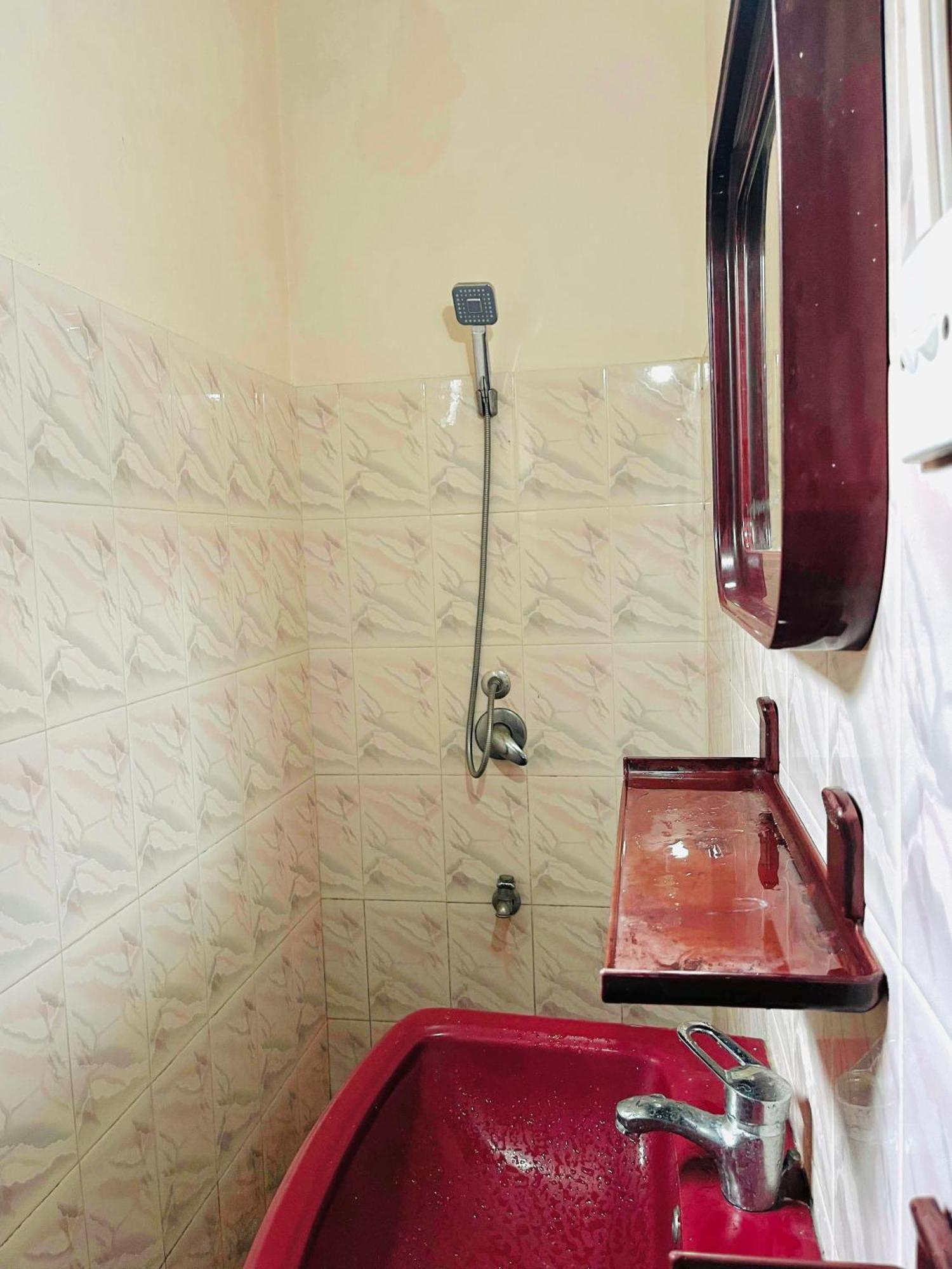 Rivinson Hotel Negombo Kamer foto